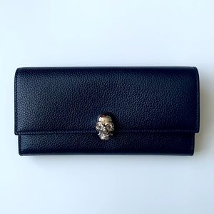 Alexander McQueen pebble leather Continent wallet.
